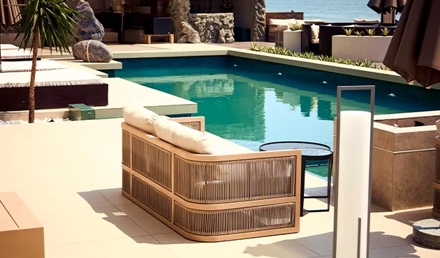 Pool and cabanas at Alora Beach Resort